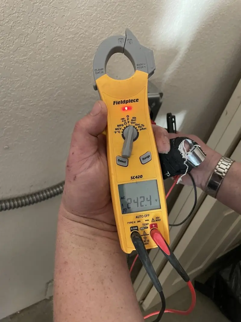 Voltage testing with clamp meter during Outlet Installation in Warminster